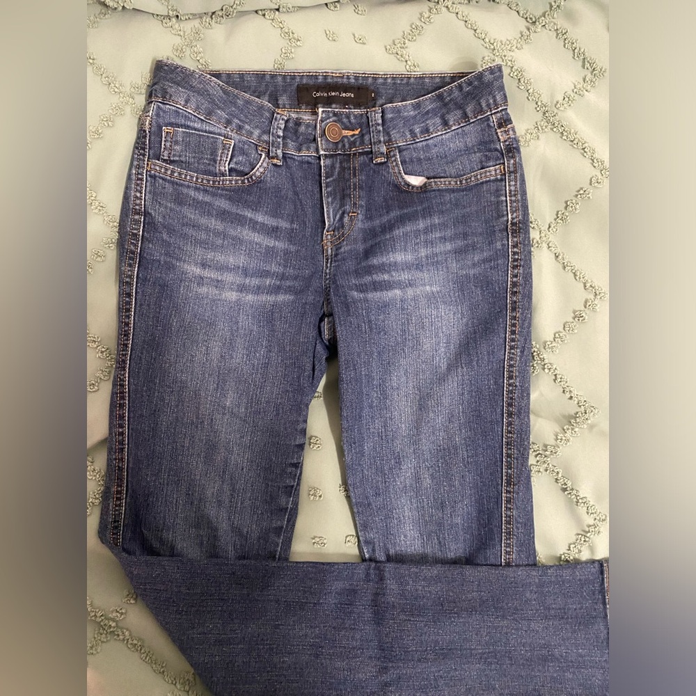 Calvin Klein Low-Rise Dark Wash Bootcutish Jeans Size 2 but can fit Size 3,4,5.